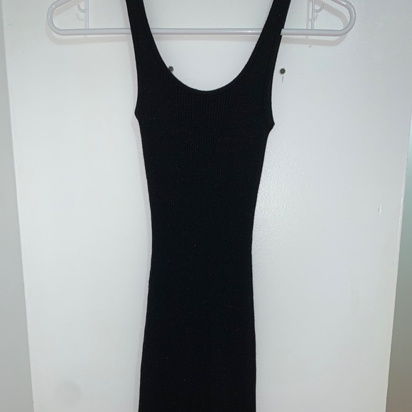 Black Sparkly Bodycon Dress With Low Pleats - Picture 2 of 3